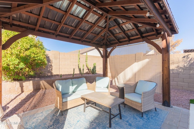 view of patio with a gazebo and an outdoor hangout area