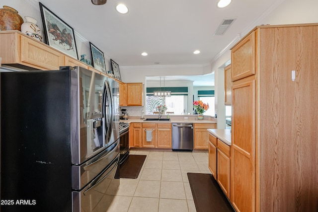 kitchen featuring visible vents, ornamental molding, stainless steel appliances, light countertops, and light tile patterned flooring