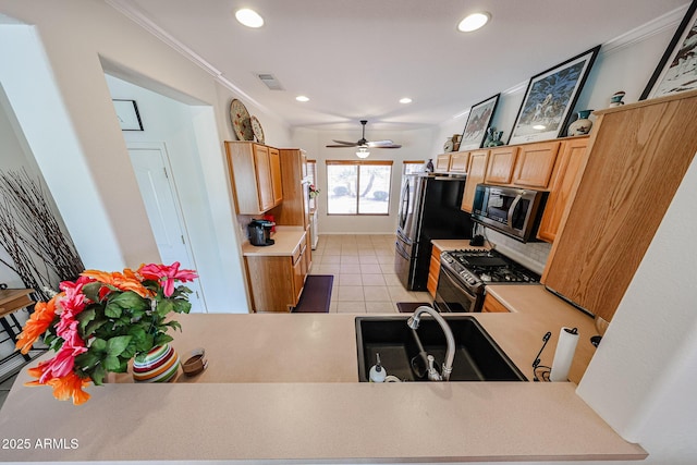 kitchen featuring crown molding, stainless steel appliances, recessed lighting, visible vents, and light tile patterned flooring