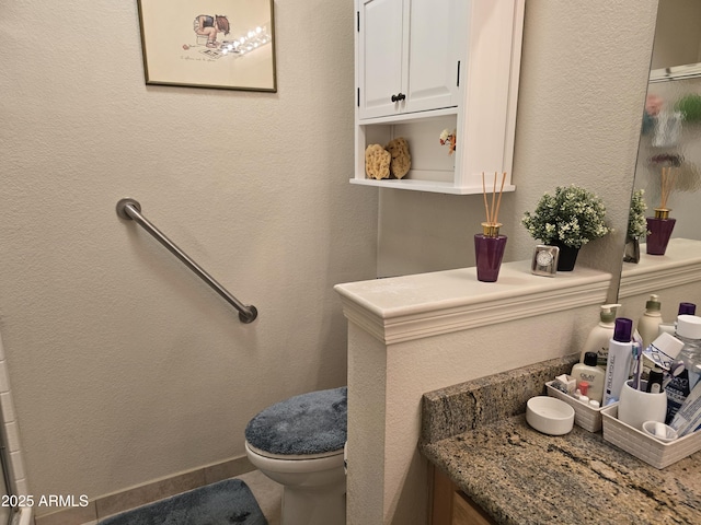 bathroom featuring toilet