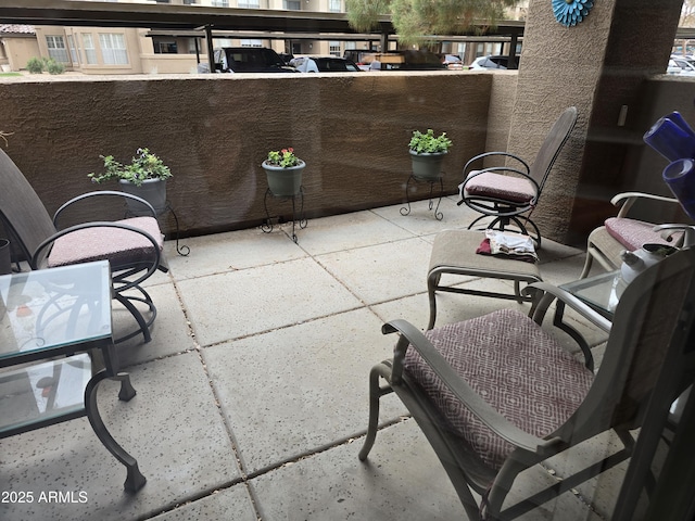 view of patio / terrace featuring a balcony