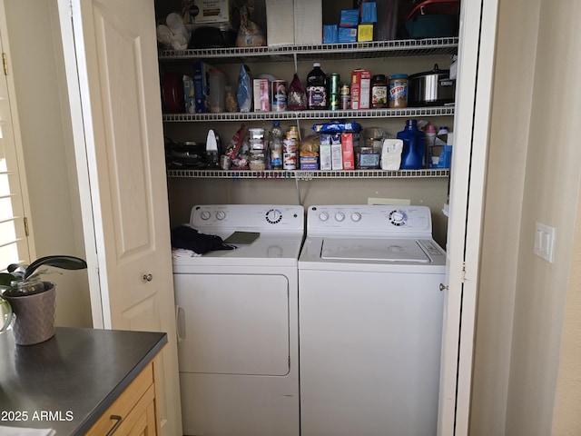 washroom featuring washer and dryer