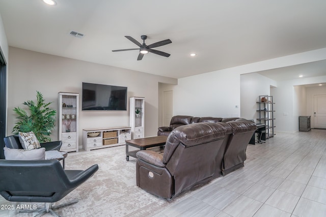 living room with recessed lighting, visible vents, and ceiling fan