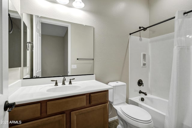 full bathroom with vanity, shower / tub combo, and toilet