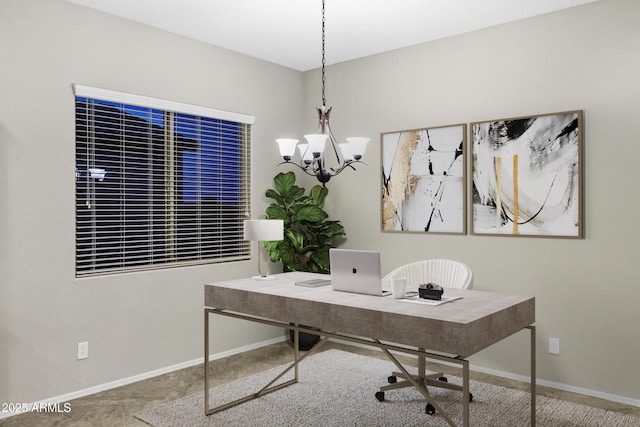 carpeted office featuring a chandelier