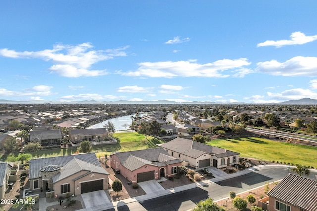 bird's eye view featuring a residential view and a mountain view