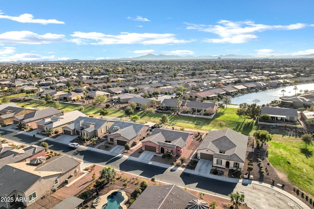 aerial view featuring a mountain view and a residential view