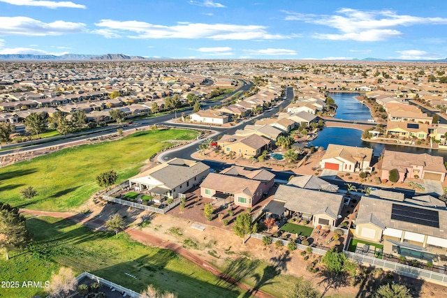 aerial view featuring a residential view and a water and mountain view