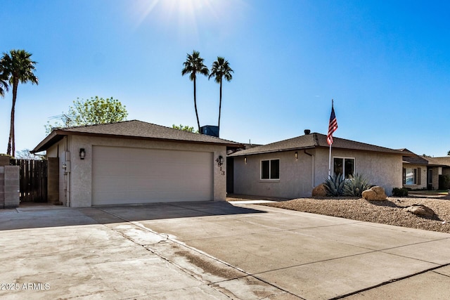 ranch-style home with a garage