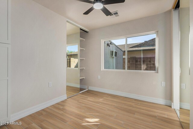 empty room featuring ceiling fan