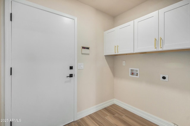 clothes washing area with light hardwood / wood-style floors, electric dryer hookup, hookup for a washing machine, and cabinets