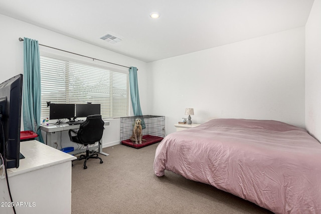 bedroom with recessed lighting, visible vents, and light carpet