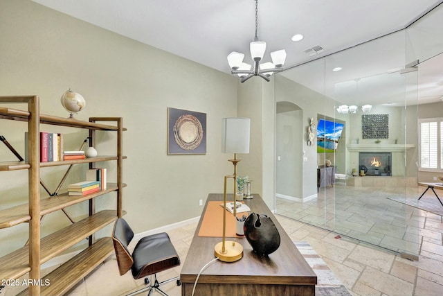 3531 E Norwood Cir, Mesa, AZ 85213 - home office featuring a chandelier, arched walkways, stone tile flooring, baseboards, and recessed lighting