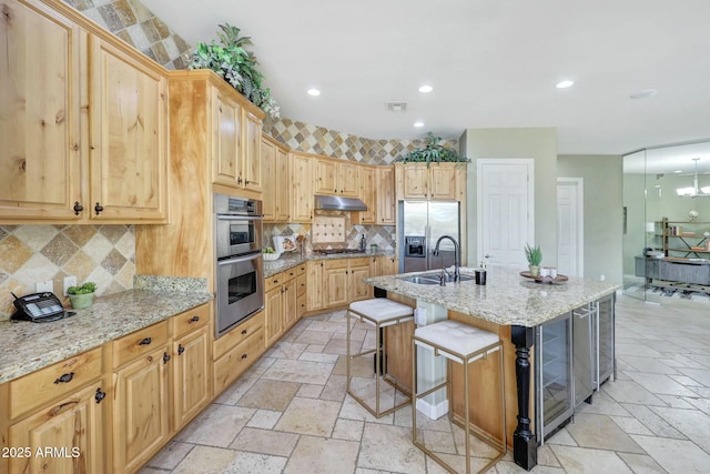 3531 E Norwood Cir, Mesa, AZ 85213 - kitchen featuring stainless steel appliances, a sink, stone tile flooring, under cabinet range hood, and recessed lighting