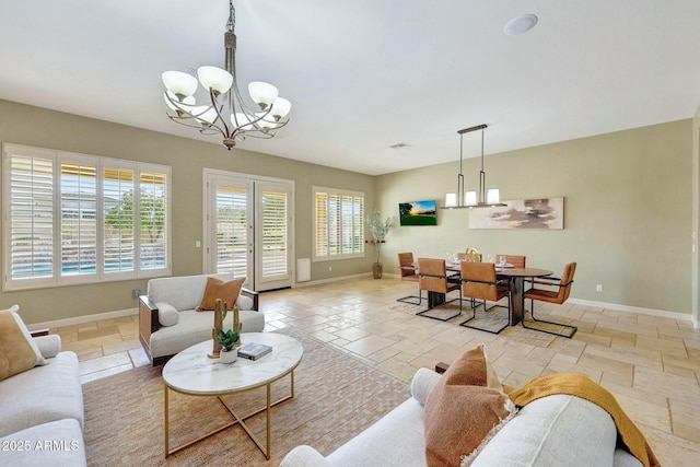 3531 E Norwood Cir, Mesa, AZ 85213 - living room with a chandelier and baseboards
