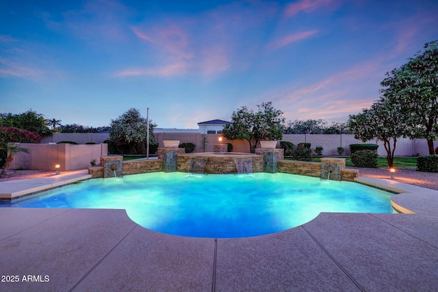 3531 E Norwood Cir, Mesa, AZ 85213 - pool at dusk featuring a patio area and a fenced backyard