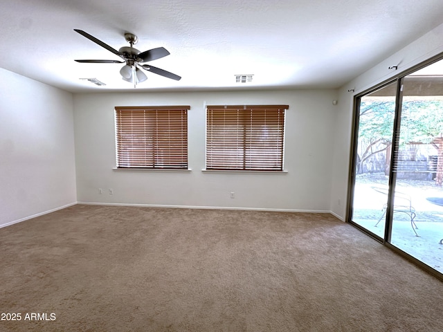 33506 N 24th Dr, Phoenix, AZ 85085 - spare room with a ceiling fan, carpet, and baseboards