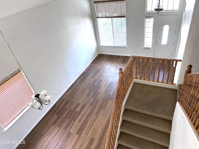 33506 N 24th Dr, Phoenix, AZ 85085 - foyer featuring wood finished floors, baseboards, stairs, and healthy amount of natural light