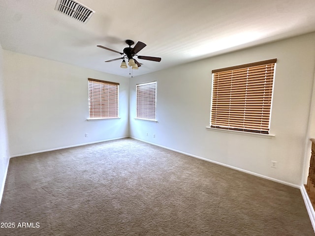 33506 N 24th Dr, Phoenix, AZ 85085 - empty room with ceiling fan, carpet floors, and baseboards