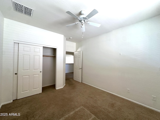 33506 N 24th Dr, Phoenix, AZ 85085 - unfurnished bedroom featuring carpet, a closet, baseboards, and a ceiling fan