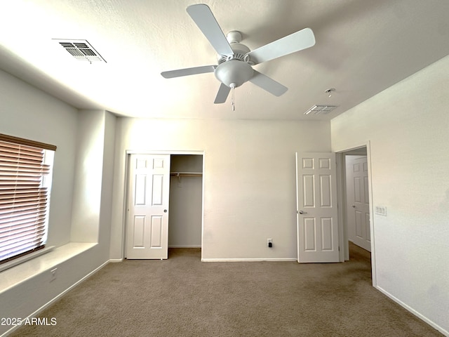 33506 N 24th Dr, Phoenix, AZ 85085 - unfurnished bedroom featuring carpet floors, baseboards, and a closet