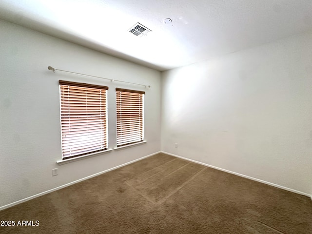 33506 N 24th Dr, Phoenix, AZ 85085 - spare room featuring carpet flooring and baseboards