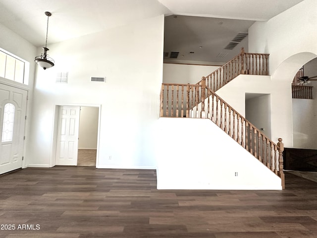 33506 N 24th Dr, Phoenix, AZ 85085 - entryway featuring high vaulted ceiling, stairs, wood finished floors, arched walkways, and a ceiling fan