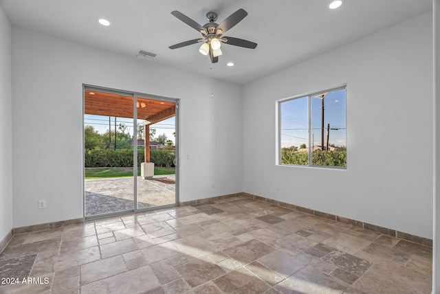 spare room featuring ceiling fan