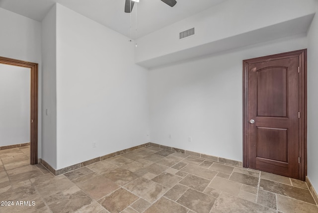 empty room featuring ceiling fan