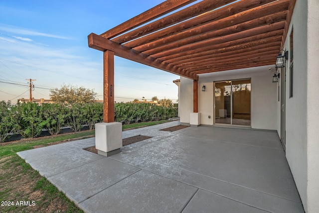 view of patio featuring a pergola