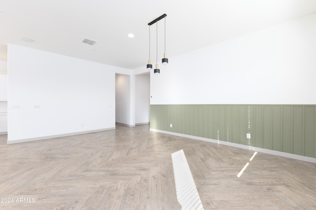 spare room with light parquet flooring