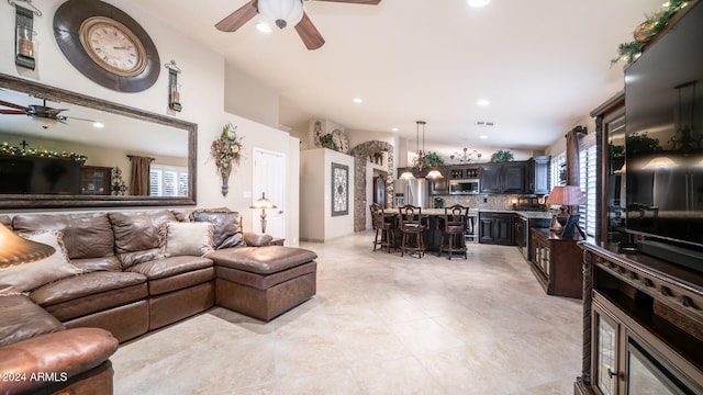 tiled living room with lofted ceiling