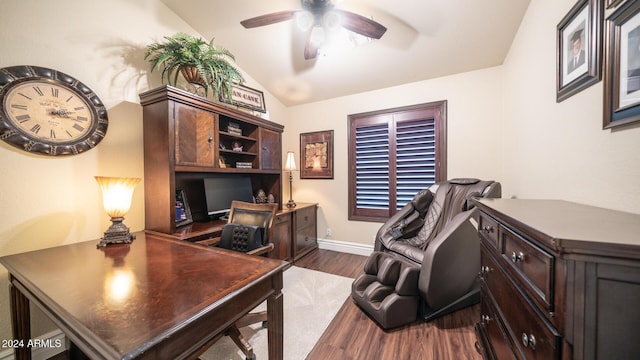 office area featuring ceiling fan, dark hardwood / wood-style flooring, and lofted ceiling