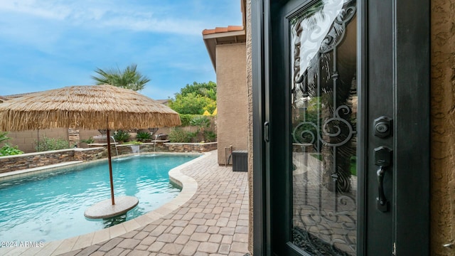 view of pool featuring pool water feature