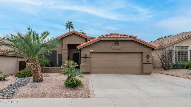 view of front of home with a garage