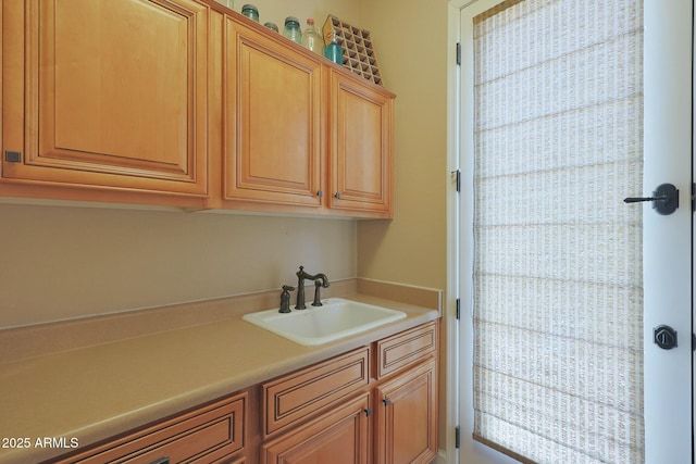 laundry room featuring a sink
