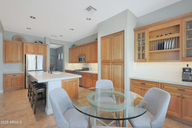 dining room featuring light tile patterned floors and recessed lighting