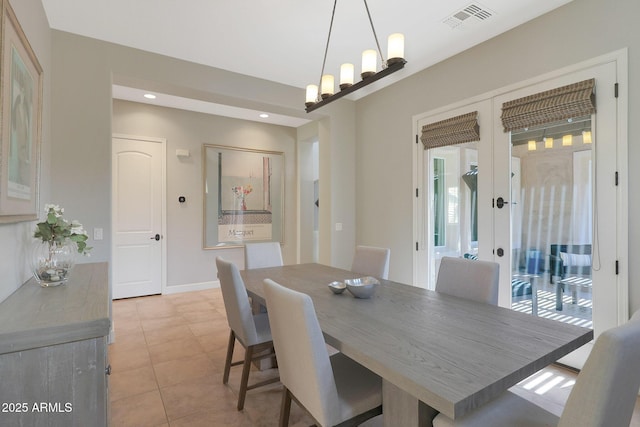 dining room with french doors, recessed lighting, baseboards, and light tile patterned floors