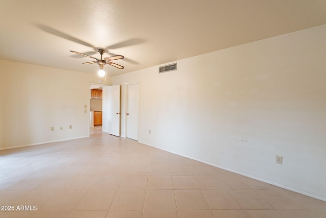 empty room featuring ceiling fan