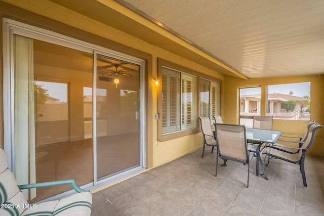 sunroom / solarium featuring wooden ceiling