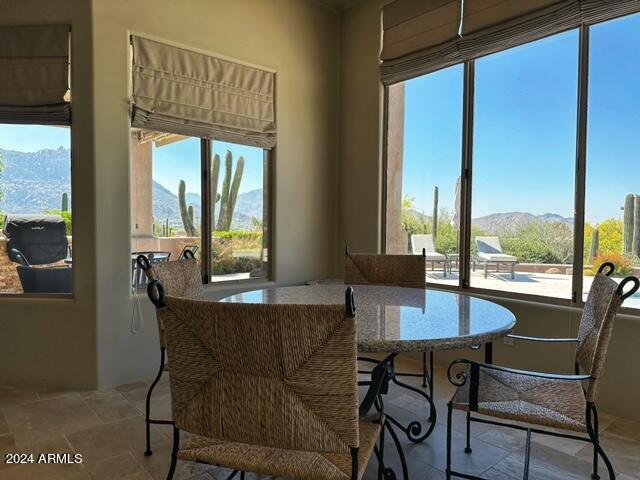 dining area with a mountain view