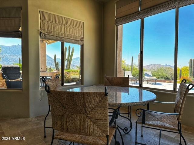 dining area with a mountain view