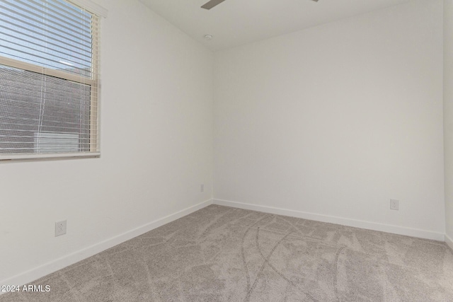 empty room with light colored carpet