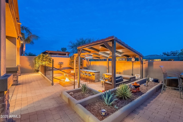 view of patio with outdoor lounge area and fence