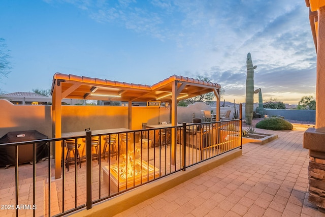 view of patio / terrace with fence and a pergola