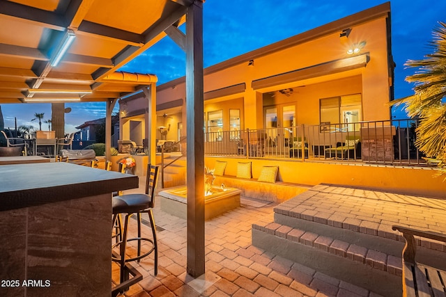 view of patio featuring outdoor dry bar