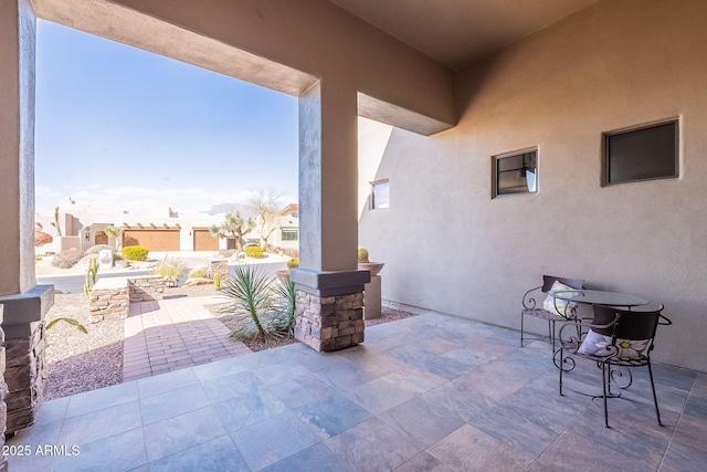 view of patio / terrace featuring a residential view