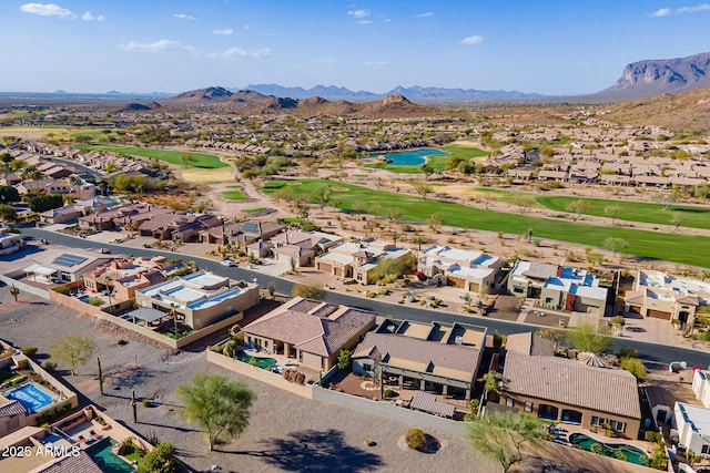 bird's eye view with a residential view, a mountain view, and golf course view