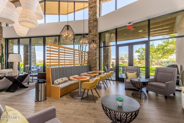 community lobby featuring a towering ceiling