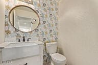 28422 N 32nd Ln, Phoenix, AZ 85083 - half bath with toilet, wallpapered walls, and vanity